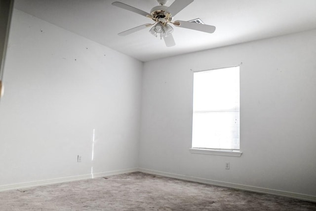 carpeted empty room with ceiling fan