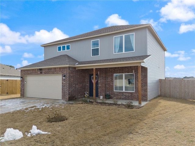 front of property featuring a garage