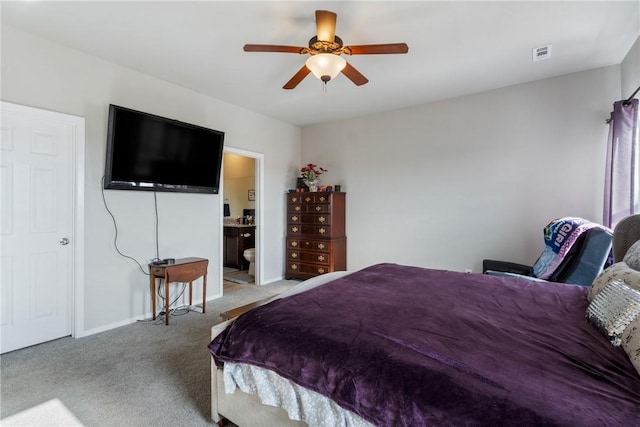 carpeted bedroom featuring ceiling fan and connected bathroom