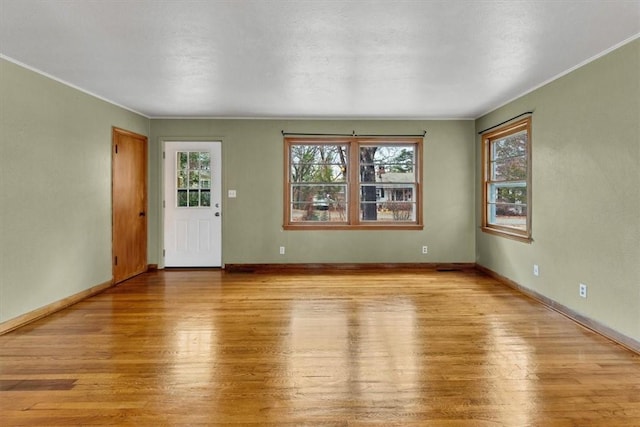 unfurnished living room featuring light hardwood / wood-style flooring