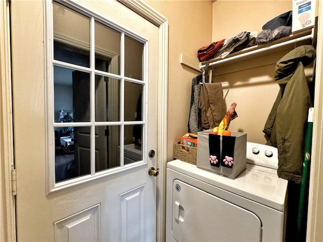 laundry area with laundry area and washer / clothes dryer