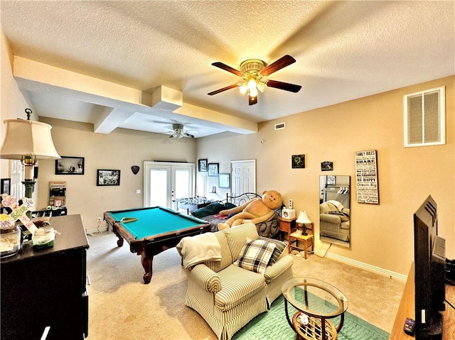 recreation room featuring carpet floors, french doors, visible vents, ceiling fan, and billiards