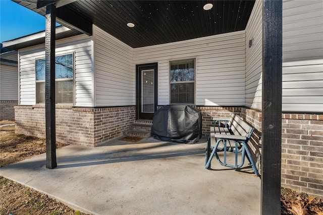 view of patio / terrace featuring a grill