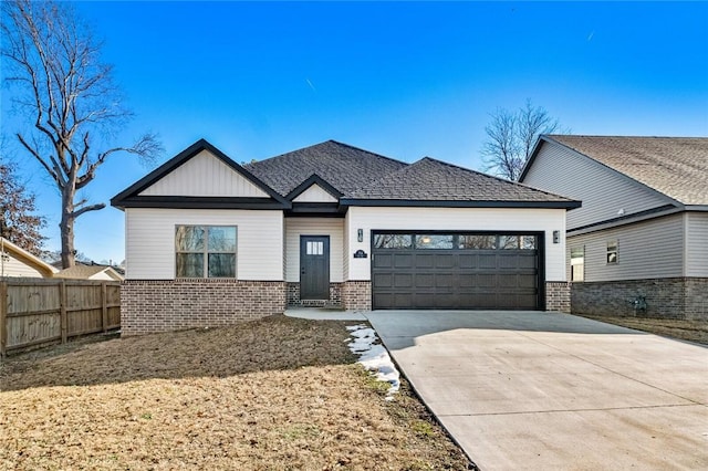 view of front of property with a garage