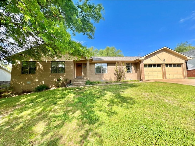 ranch-style home with a front lawn and a garage