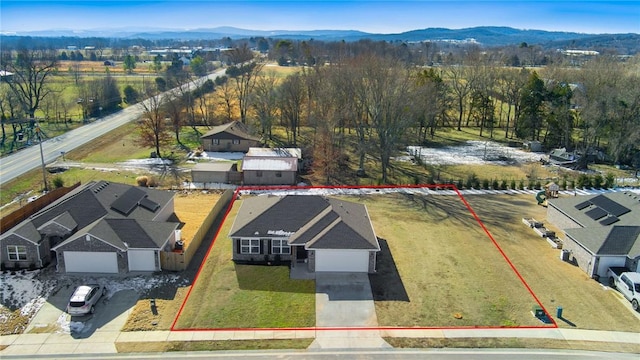 bird's eye view with a mountain view