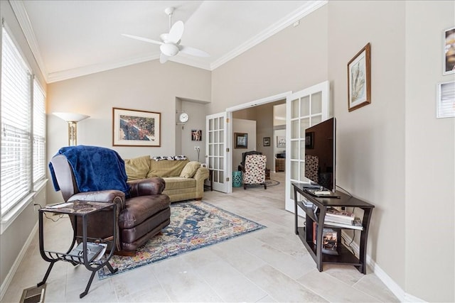 tiled living room featuring vaulted ceiling, crown molding, a healthy amount of sunlight, and french doors