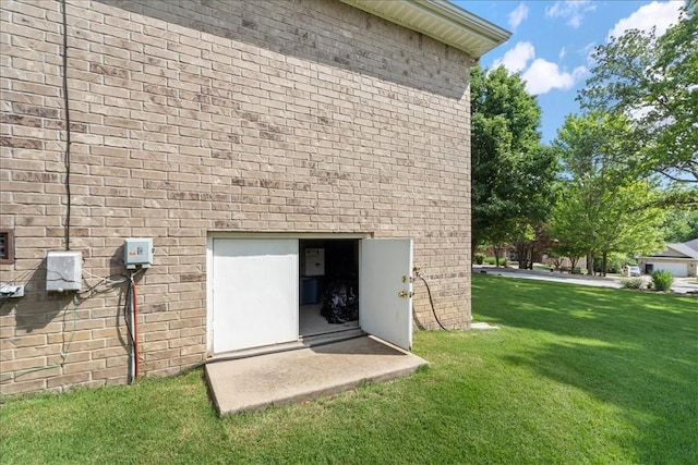 rear view of house with a lawn