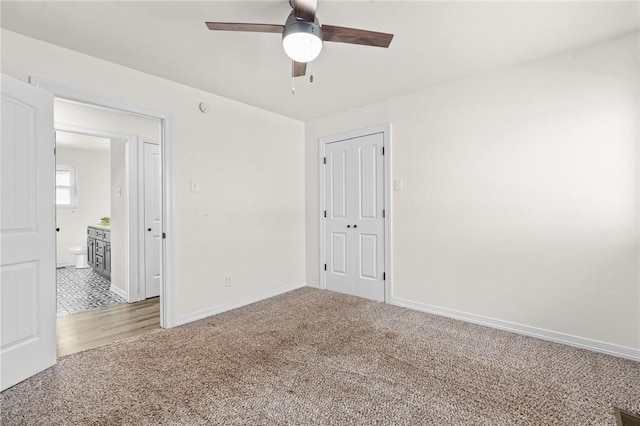 unfurnished room with carpet floors and ceiling fan