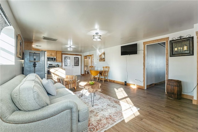 living room with hardwood / wood-style floors