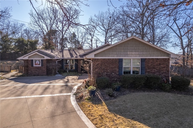 ranch-style house with a front yard