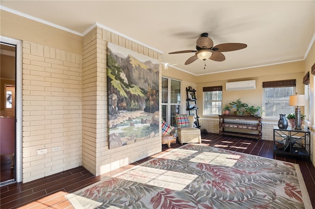 sunroom / solarium with ceiling fan and a wall mounted AC