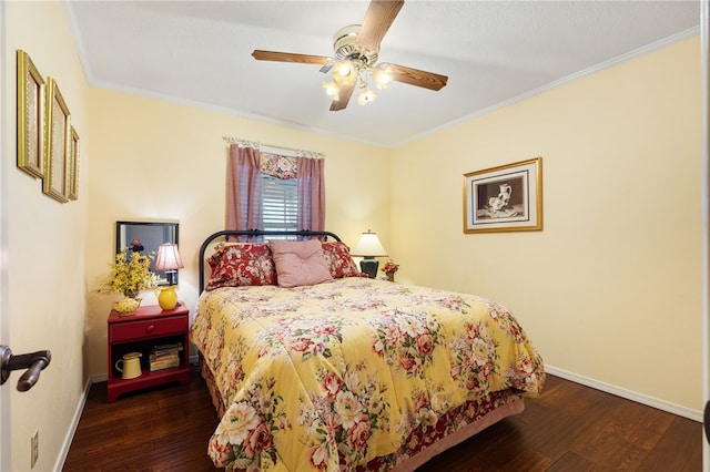 bedroom with dark hardwood / wood-style flooring, ornamental molding, and ceiling fan