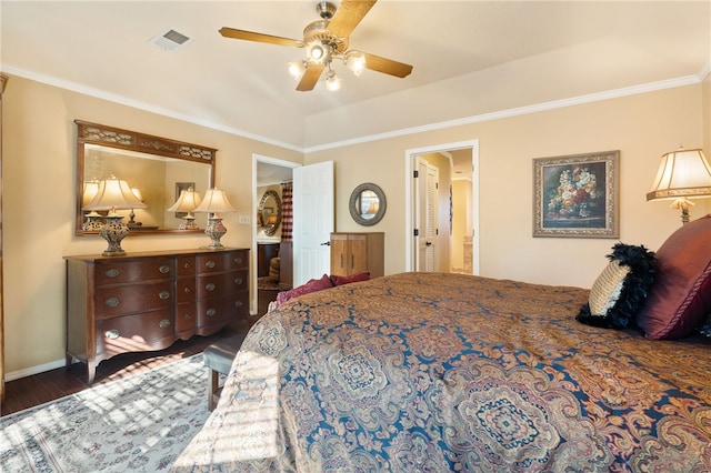 bedroom with ornamental molding, dark hardwood / wood-style floors, and ceiling fan