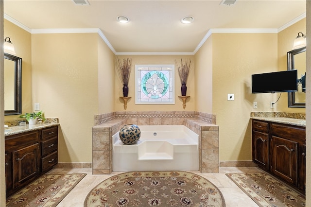 bathroom featuring vanity, a tub, ornamental molding, and tile patterned floors