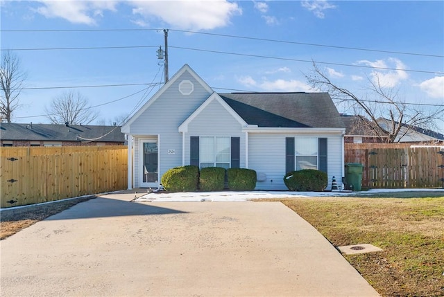 ranch-style house with a front yard