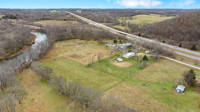 bird's eye view featuring a rural view and a water view