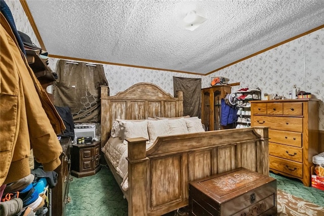 carpeted bedroom featuring a textured ceiling and crown molding