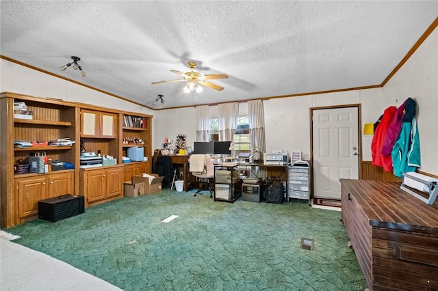 office area with ceiling fan, crown molding, a textured ceiling, and dark colored carpet