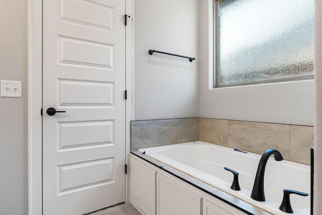 bathroom featuring a bathing tub