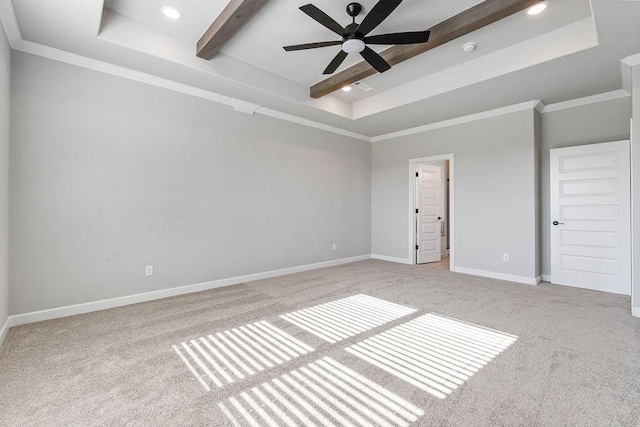 unfurnished bedroom with ceiling fan, crown molding, a raised ceiling, and light carpet