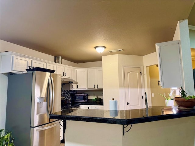 kitchen featuring stainless steel refrigerator with ice dispenser, white cabinetry, kitchen peninsula, and a textured ceiling