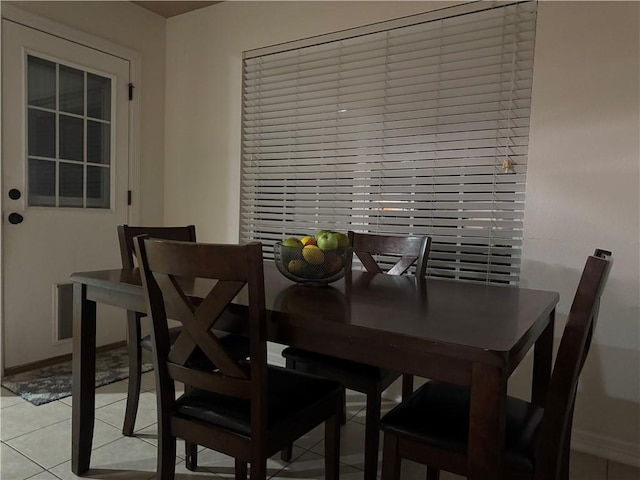 view of tiled dining space