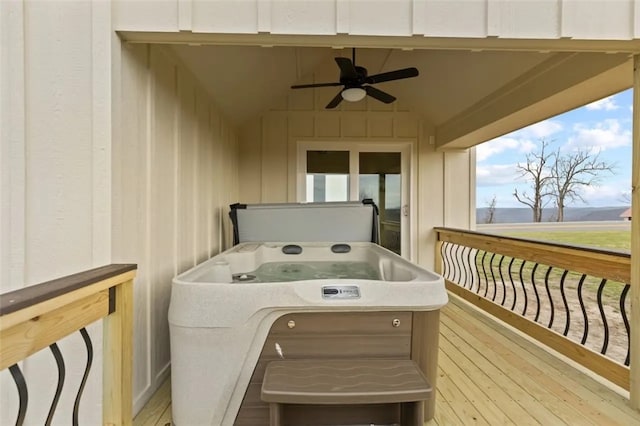 wooden deck with ceiling fan