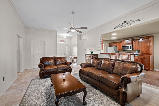 living room with ceiling fan and ornamental molding