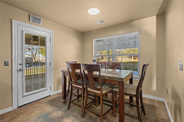 dining area featuring a healthy amount of sunlight