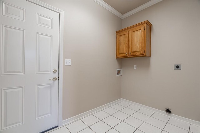 washroom with hookup for an electric dryer, light tile patterned flooring, hookup for a washing machine, cabinets, and ornamental molding