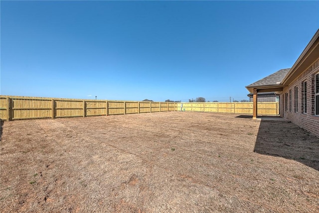 view of yard featuring fence