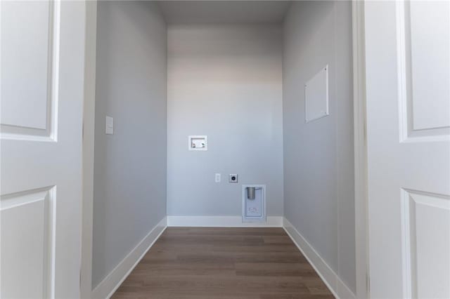 washroom featuring washer hookup, dark hardwood / wood-style flooring, and hookup for an electric dryer