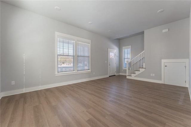 foyer entrance with hardwood / wood-style flooring