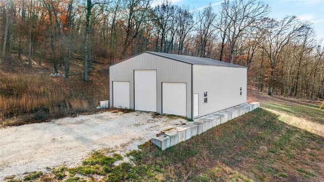 view of outbuilding with a garage