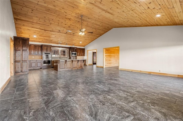 unfurnished living room featuring wooden ceiling, ceiling fan, and high vaulted ceiling