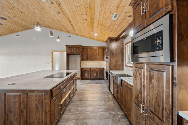 kitchen with lofted ceiling, sink, wooden ceiling, stainless steel microwave, and black electric cooktop