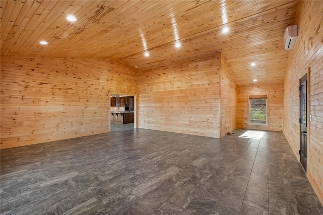 empty room with a wall mounted AC, wood ceiling, wood walls, and high vaulted ceiling