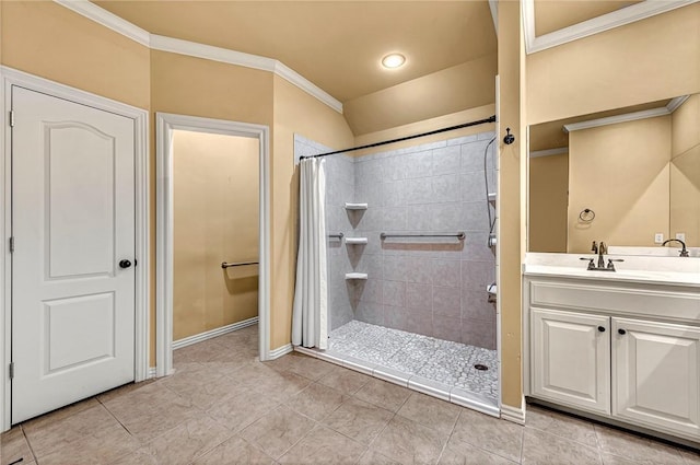 bathroom featuring vanity, ornamental molding, and walk in shower