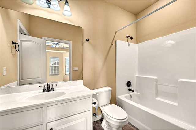 full bathroom with bathtub / shower combination, toilet, and vanity