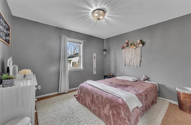 bedroom featuring a textured ceiling