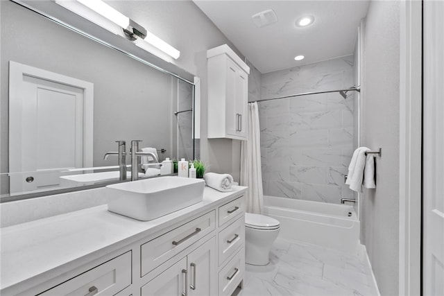 full bathroom with shower / bath combo with shower curtain, toilet, and vanity