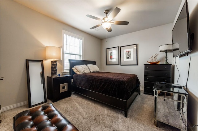 bedroom with ceiling fan and carpet flooring