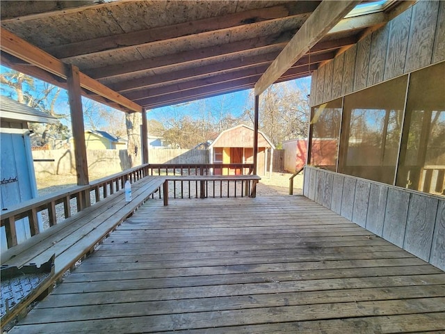 deck featuring a storage shed