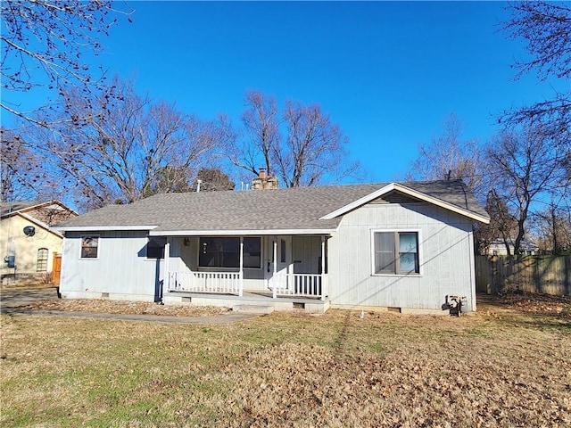 single story home featuring a front yard and covered porch