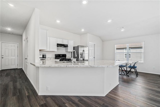 kitchen featuring dark wood-type flooring, white cabinetry, sink, and stainless steel appliances