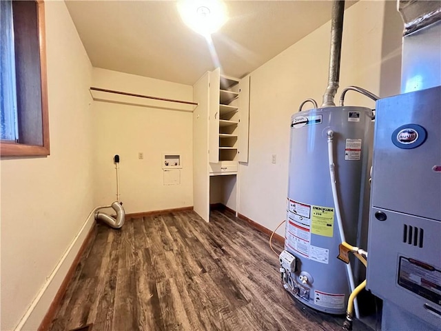 utility room featuring gas water heater