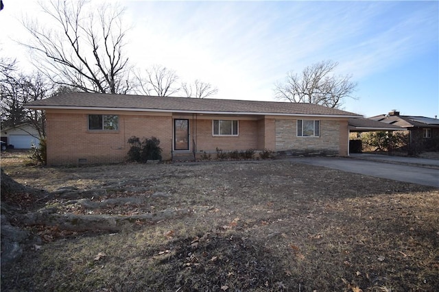 ranch-style house with a carport