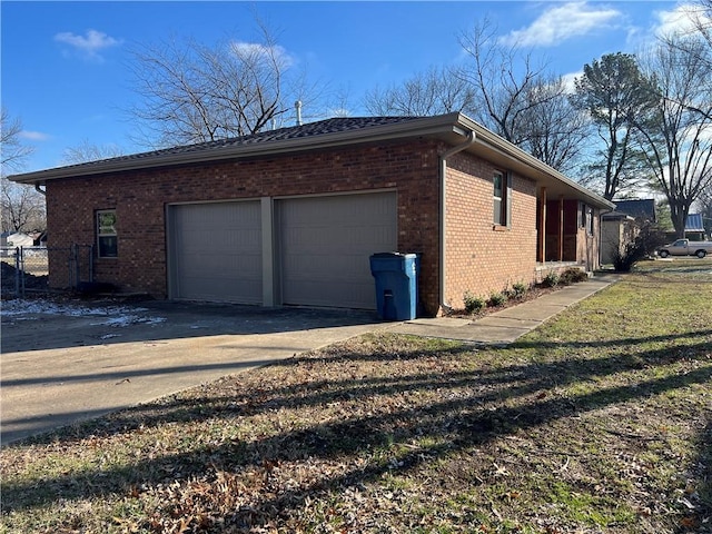 view of property exterior with a garage