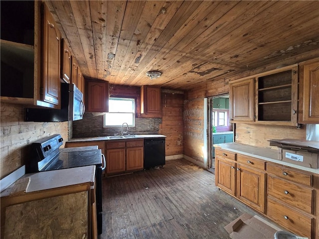 kitchen with dark wood-type flooring, wooden ceiling, appliances with stainless steel finishes, and sink